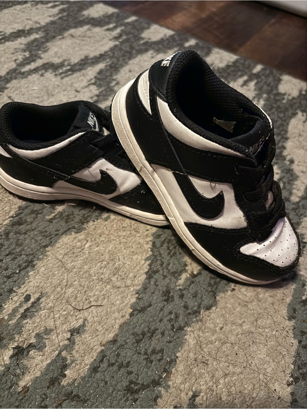 Nike Kids Black and White Low-Top Sneakers with Swoosh